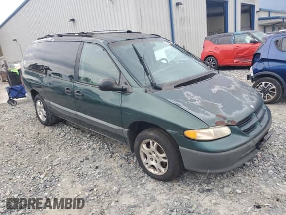 1997 Dodge Caravan SE z VIN 2B4GP44R4VR202585, wystawiony jako Copart lot #68703985 z przebiegiem 188 500 mil mil oraz Szkoda całkowita • Salvage title. Historia ofert i sprzedaży dostępna na DreamBid. Obrazek 4.