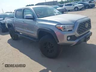 2021 Toyota Tacoma SR with VIN 5TFCZ5ANXMX268304, listed as a IAAI auction lot 43066752 with 66,578 mi miles and . Bid and sale history available at DreamBid. Image 1.