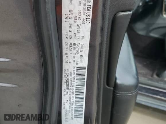 2016 Jeep Grand Cherokee Laredo with VIN 1C4RJFAG8GC390082, listed as a Copart auction lot 82210225 with 215,652 mi miles and Salvage title. Bid and sale history available at DreamBid. Image 13.