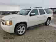 2014 Chevrolet Suburban LTZ z VIN 1GNSKKE72ER179639, wystawiony jako Copart lot #62344495 z przebiegiem 81 995 mil mil oraz Szkoda całkowita • Salvage title. Historia ofert i sprzedaży dostępna na DreamBid. Obrazek 1.