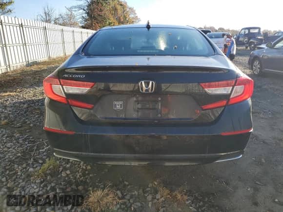 2019 Honda Accord EX-L z VIN 1HGCV1F52KA041056, wystawiony jako Copart lot #86512735 z przebiegiem Nie podano mil oraz Szkoda całkowita • Salvage title. Historia ofert i sprzedaży dostępna na DreamBid. Obrazek 6.