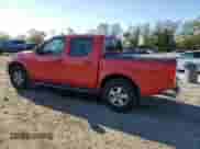 2005 Nissan Frontier Nismo with VIN 1N6AD07WX5C421164, listed as a Copart auction lot 82762115 with 176,610 mi miles and Clean title. Bid and sale history available at DreamBid. Image 2.