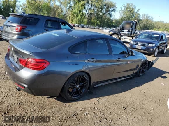 2018 BMW 4 Series 440i xDrive with VIN WBA4J7C56JBB98944, listed as a Copart auction lot 70683675 with 94,719 mi miles and Salvage title. Bid and sale history available at DreamBid. Image 3.
