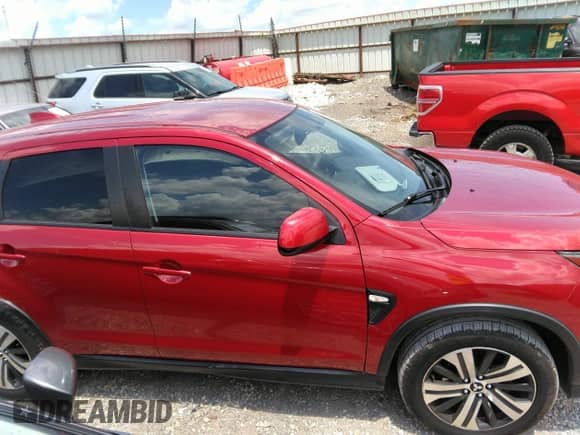 2021 Mitsubishi Outlander ES z VIN JA4ARUAU7MU009998, wystawiony jako IAAI lot #42561632 z przebiegiem 56 743 mil mil oraz . Historia ofert i sprzedaży dostępna na DreamBid. Obrazek 13.