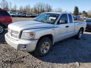 2010 Dodge Dakota with VIN 1D7CW3BP8AS174580, listed as a Copart auction lot 46615495 with 130,053 mi miles and Salvage title. Bid and sale history available at DreamBid. Image 1.