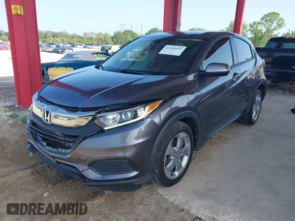 2020 Honda HR-V LX z VIN 3CZRU5H30LM718117, wystawiony jako IAAI lot #42446652 z przebiegiem 141 585 mil mil oraz . Historia ofert i sprzedaży dostępna na DreamBid. Obrazek 17.