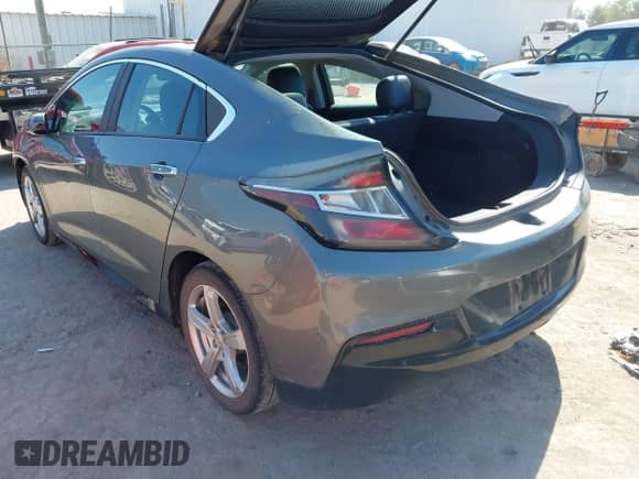 2017 Chevrolet Volt LT z VIN 1G1RA6S53HU178322, wystawiony jako IAAI lot #43347517 z przebiegiem 117 688 mil mil oraz . Historia ofert i sprzedaży dostępna na DreamBid. Obrazek 3.