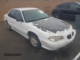 1998 Pontiac Grand Am SE with VIN 1G2NE52T7WM513702, listed as a IAAI auction lot 41503141 with 302,315 mi miles and . Bid and sale history available at DreamBid. Image 1.