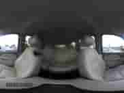 2010 Chevrolet Suburban LT z VIN 1GNUCJE03AR238548, wystawiony jako IAAI lot #42104596 z przebiegiem 153 959 mil mil oraz . Historia ofert i sprzedaży dostępna na DreamBid. Obrazek 18.