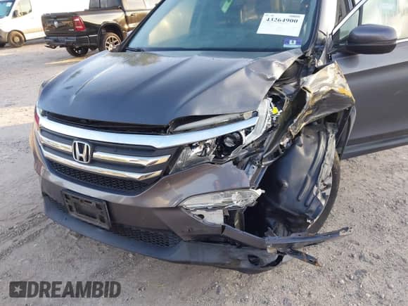 2016 Honda Pilot EX-L z VIN 5FNYF6H5XGB017033, wystawiony jako IAAI lot #43264900 z przebiegiem 143 720 mil mil oraz . Historia ofert i sprzedaży dostępna na DreamBid. Obrazek 17.