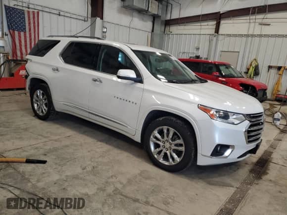 2021 Chevrolet Traverse High Country с VIN 1GNEVNKW6MJ148585, выставлен на аукционе Copart как лот 61764425 с пробегом 148 894 миль миль и На запчасти • Non repairable. История ставок и продаж доступна на DreamBid. Изображение 4.