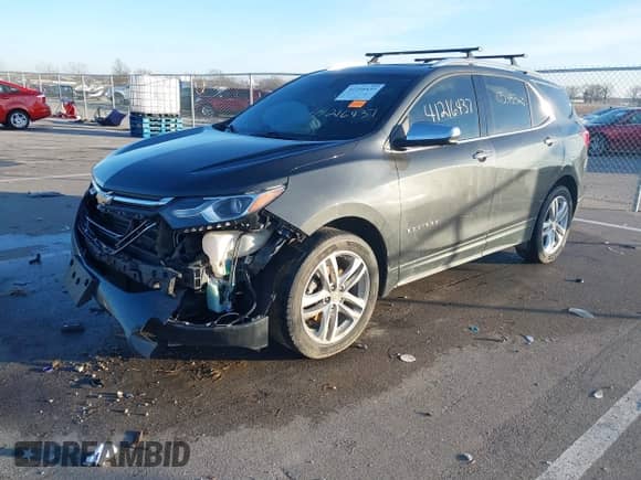 2018 Chevrolet Equinox Premier with VIN 2GNAXWEX7J6139051, listed as a IAAI auction lot 41216437 with 105,453 mi miles and . Bid and sale history available at DreamBid. Image 2.