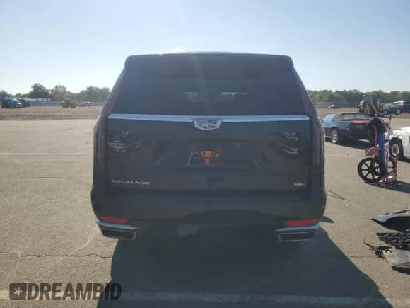 2022 Cadillac Escalade Premium Luxury с VIN 1GYS4BKL4NR327210, выставлен на аукционе Copart как лот 68992365 с пробегом 48 266 миль миль и Списание • Salvage title. История ставок и продаж доступна на DreamBid. Изображение 6.
