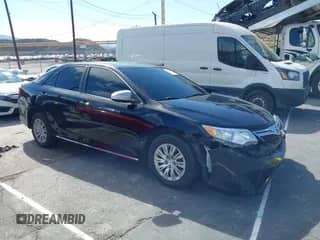 2014 Toyota Camry SE with VIN 4T1BF1FKXEU325028, listed as a IAAI auction lot 43430573 with 224,721 mi miles and . Bid and sale history available at DreamBid. Image 1.