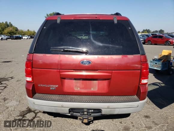 2002 Ford Explorer XLT с VIN 1FMDU73E72ZA48322, выставлен на аукционе Copart как лот 82130645 с пробегом 221 898 миль миль и Списание • Salvage title. История ставок и продаж доступна на DreamBid. Изображение 6.