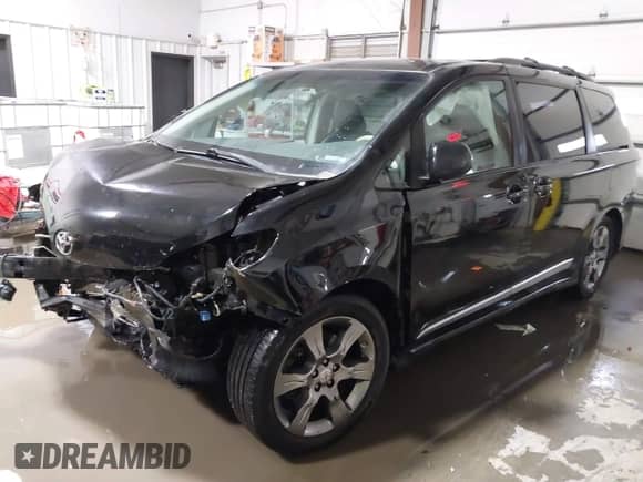 2011 Toyota Sienna SE with VIN 5TDXK3DCXBS067929, listed as a IAAI auction lot 41552044 with 203,697 mi miles and . Bid and sale history available at DreamBid. Image 2.