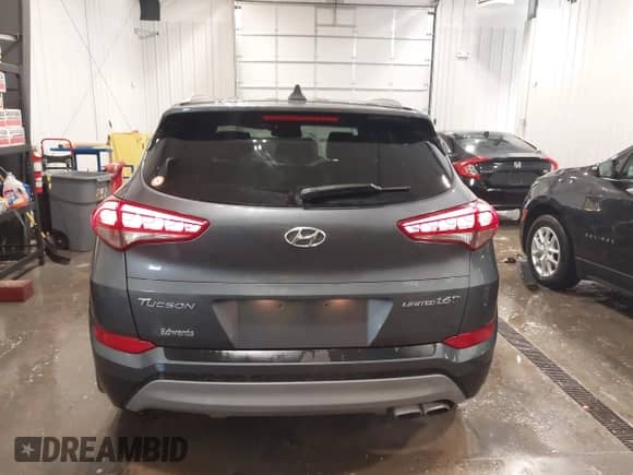 2018 Hyundai Tucson Value z VIN KM8J33A28JU615981, wystawiony jako IAAI lot #42281881 z przebiegiem 71 835 mil mil oraz . Historia ofert i sprzedaży dostępna na DreamBid. Obrazek 17.