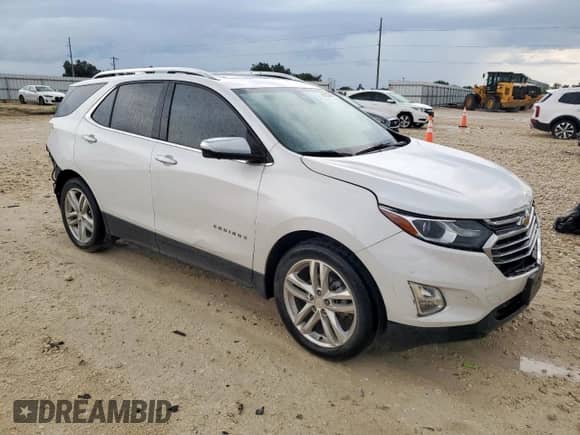 2020 Chevrolet Equinox Premier с VIN 3GNAXNEV2LS733396, выставлен на аукционе Copart как лот 69283535 с пробегом 41 486 миль миль и Списание • Salvage title. История ставок и продаж доступна на DreamBid. Изображение 4.