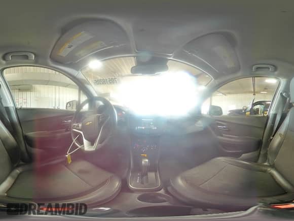 2018 Chevrolet Trax LT z VIN 3GNCJLSB9JL366027, wystawiony jako Copart lot #70519205 z przebiegiem 79 852 mil mil oraz Nie do naprawy • Non repairable. Historia ofert i sprzedaży dostępna na DreamBid. Obrazek 16.