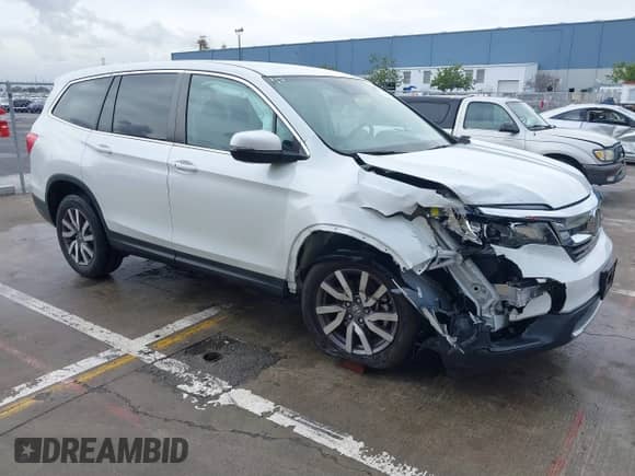 2020 Honda Pilot EX z VIN 5FNYF5H34LB019069, wystawiony jako IAAI lot #41538583 z przebiegiem 55 424 mil mil oraz . Historia ofert i sprzedaży dostępna na DreamBid. Obrazek 1.