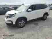 2020 Honda Pilot EX-L z VIN 5FNYF6H50LB060421, wystawiony jako Copart lot #80111525 z przebiegiem 58 305 mil mil oraz Szkoda całkowita • Salvage title. Historia ofert i sprzedaży dostępna na DreamBid. Obrazek 1.
