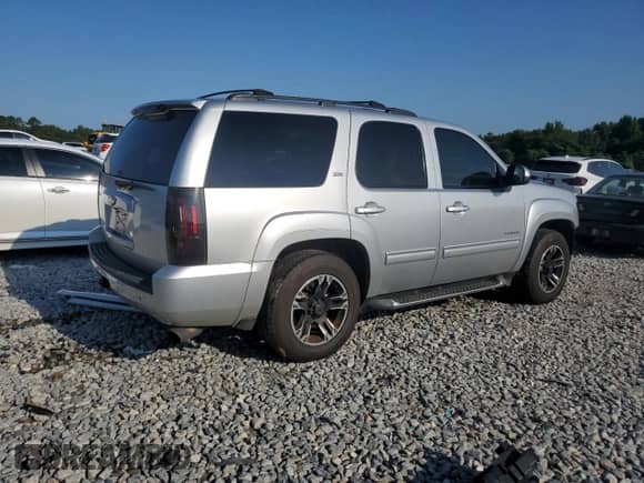 2012 Chevrolet Tahoe LT with VIN 1GNSCBE04CR149264, listed as a Copart auction lot 68937495 with 150,260 mi miles and Salvage title. Bid and sale history available at DreamBid. Image 3.