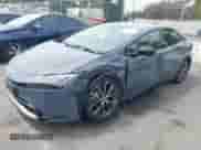 2023 Toyota Prius LE with VIN JTDACAAU6P3006154, listed as a IAAI auction lot 43107392 with 143,761 mi miles and . Bid and sale history available at DreamBid. Image 2.