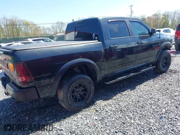 2018 Ram 1500 Rebel with VIN 1C6RR7YT4JS145768, listed as a IAAI auction lot 41593734 with 66,820 mi miles and . Bid and sale history available at DreamBid. Image 4.