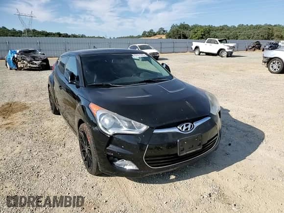 2013 Hyundai Veloster w/Black Int с VIN KMHTC6ADXDU159174, выставлен на аукционе Copart как лот 67471915 с пробегом 146 394 миль миль и Списание • Salvage title. История ставок и продаж доступна на DreamBid. Изображение 13.