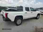 2024 Toyota Tacoma SR with VIN 3TYKD5HN6RT010587, listed as a Copart auction lot 69181285 with 17,942 mi miles and Salvage title. Bid and sale history available at DreamBid. Image 3.