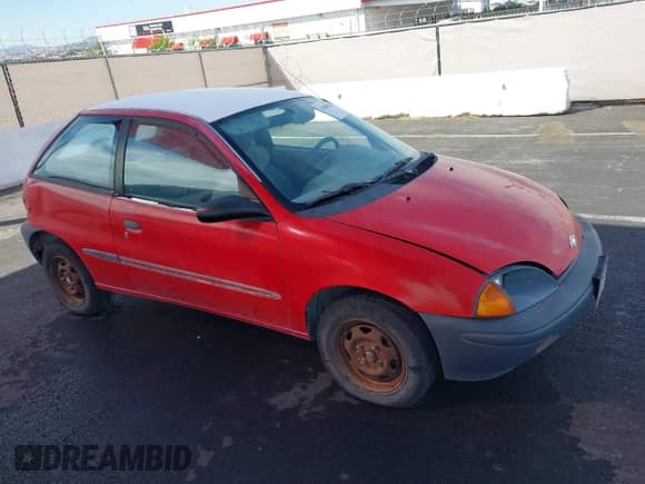1996 Chevrolet Metro z VIN 2C1MR2261T6707346, wystawiony jako IAAI lot #41806832 z przebiegiem 276 650 mil mil oraz . Historia ofert i sprzedaży dostępna na DreamBid. Obrazek 13.