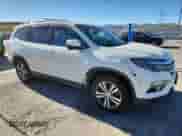 2016 Honda Pilot EX-L with VIN 5FNYF6H85GB077280, listed as a Copart auction lot 82600615 with 192,110 mi miles and Clean title. Bid and sale history available at DreamBid. Image 4.