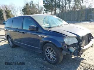 2014 Dodge Grand Caravan American Value with VIN 2C4RDGBG4ER193779, listed as a IAAI auction lot 41447552 with 89,498 mi miles and . Bid and sale history available at DreamBid. Image 1.
