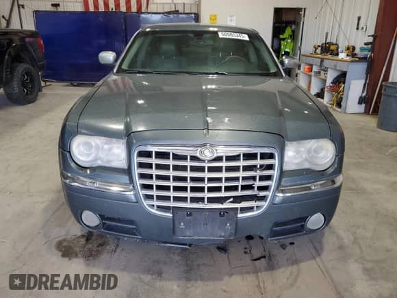 2005 Chrysler 300 C с VIN 2C3AA63HX5H608038, выставлен на аукционе Copart как лот 60085345 с пробегом 178 246 миль миль и Чистый • Clean title. История ставок и продаж доступна на DreamBid. Изображение 5.