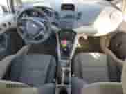 2013 Ford Fiesta S z VIN 3FADP4TJ2DM113899, wystawiony jako Copart lot #80876335 z przebiegiem 171 096 mil mil oraz Czysty tytuł • Clean title. Historia ofert i sprzedaży dostępna na DreamBid. Obrazek 8.