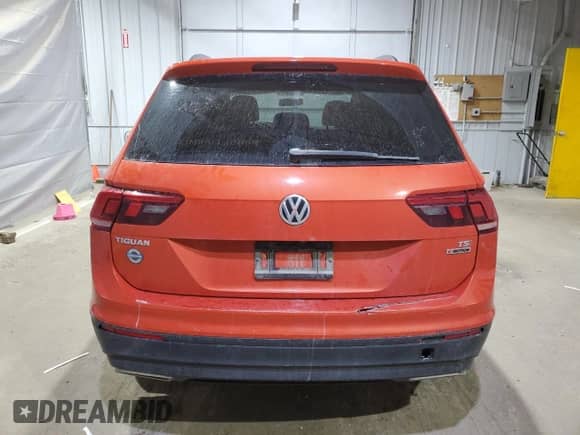 2018 Volkswagen Tiguan S с VIN 3VV0B7AX7JM089547, выставлен на аукционе Copart как лот 70453005 с пробегом 109 045 миль миль и Списание • Salvage title. История ставок и продаж доступна на DreamBid. Изображение 6.