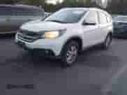 2014 Honda CR-V EX-L with VIN 5J6RM4H76EL027398, listed as a IAAI auction lot 43227212 with 196,915 mi miles and . Bid and sale history available at DreamBid. Image 2.