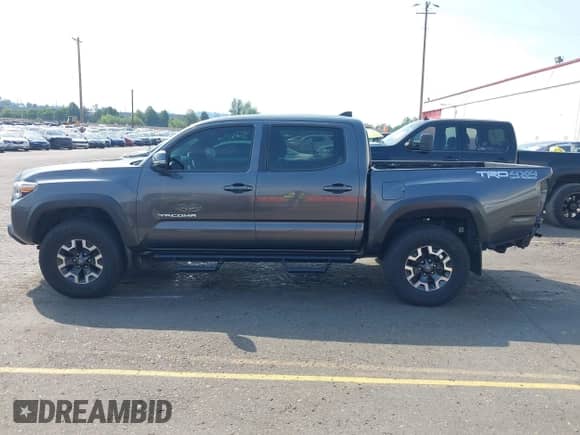 2019 Toyota Tacoma SR z VIN 3TMCZ5AN6KM229020, wystawiony jako IAAI lot #43090158 z przebiegiem 117 151 mil mil oraz . Historia ofert i sprzedaży dostępna na DreamBid. Obrazek 15.