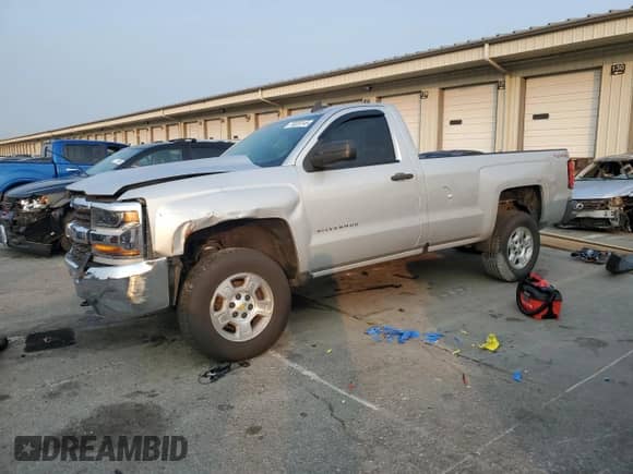 2016 Chevrolet Silverado 1500 LS with VIN 1GCNKNEH8GZ351708, listed as a Copart auction lot 70326145 with 157,291 mi miles and Salvage title. Bid and sale history available at DreamBid. Image 1.