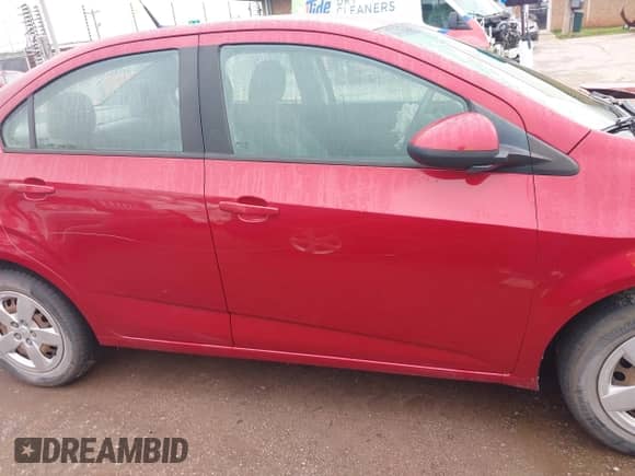 2014 Chevrolet Sonic LS with VIN 1G1JA5SH0E4130239, listed as a IAAI auction lot 42193639 with 124,503 mi miles and . Bid and sale history available at DreamBid. Image 13.