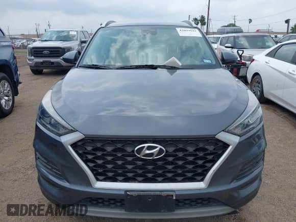 2021 Hyundai Tucson Ultimate with VIN KM8J33AL9MU409114, listed as a IAAI auction lot 42099041 with Not provided miles and . Bid and sale history available at DreamBid. Image 6.