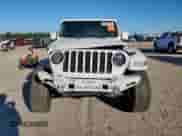 2021 Jeep Wrangler Unlimited Sahara with VIN 1C4HJXENXMW509657, listed as a Copart auction lot 90916025 with 87,621 mi miles and Salvage title. Bid and sale history available at DreamBid. Image 6.