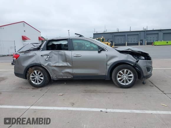 2018 Kia Sorento LX with VIN 5XYPGDA53JG370995, listed as a IAAI auction lot 42252504 with 101,481 mi miles and . Bid and sale history available at DreamBid. Image 13.
