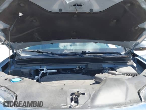 2022 Honda Pilot Touring 7-Passenger z VIN 5FNYF5H6XNB019297, wystawiony jako IAAI lot #43086671 z przebiegiem 29 833 mil mil oraz . Historia ofert i sprzedaży dostępna na DreamBid. Obrazek 10.