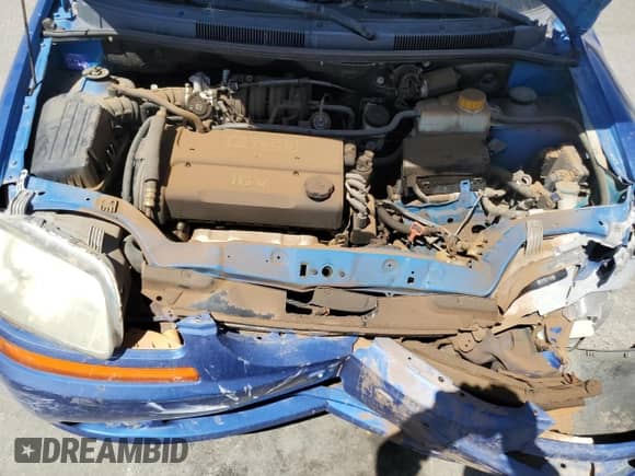 2005 Chevrolet Aveo LS с VIN KL1TD62695B303190, выставлен на аукционе Copart как лот 54049815 с пробегом 143 668 миль миль и Списание • Salvage title. История ставок и продаж доступна на DreamBid. Изображение 11.