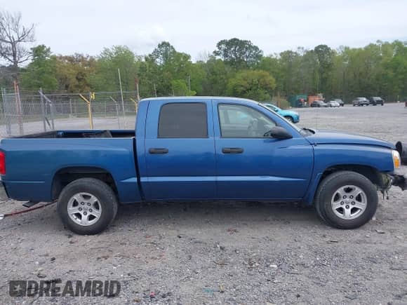 2006 Dodge Dakota SLT with VIN 1D7HE48K26S517398, listed as a IAAI auction lot 41961448 with 298,840 mi miles and . Bid and sale history available at DreamBid. Image 13.