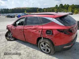 2022 Hyundai Tucson SEL with VIN 5NMJB3AE0NH137781, listed as a Copart auction lot 71326295 with 39,818 mi miles and Salvage title. Bid and sale history available at DreamBid. Image 2.