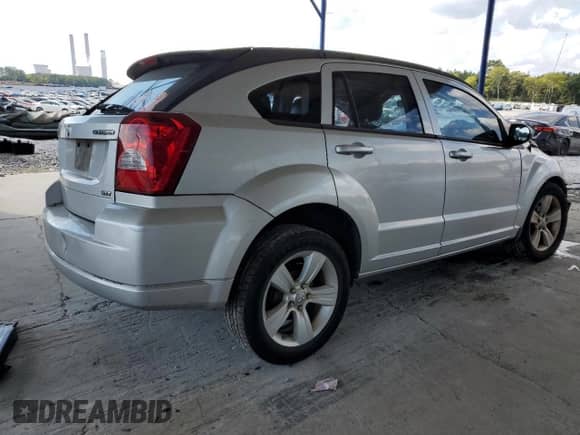 2010 Dodge Caliber SXT with VIN 1B3CB4HA8AD635331, listed as a Copart auction lot 71372545 with Not provided miles and Salvage title. Bid and sale history available at DreamBid. Image 3.