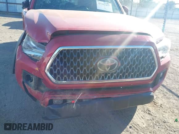 2019 Toyota Tacoma SR5 with VIN 3TMAZ5CNXKM102209, listed as a IAAI auction lot 43392417 with 94,767 mi miles and . Bid and sale history available at DreamBid. Image 17.