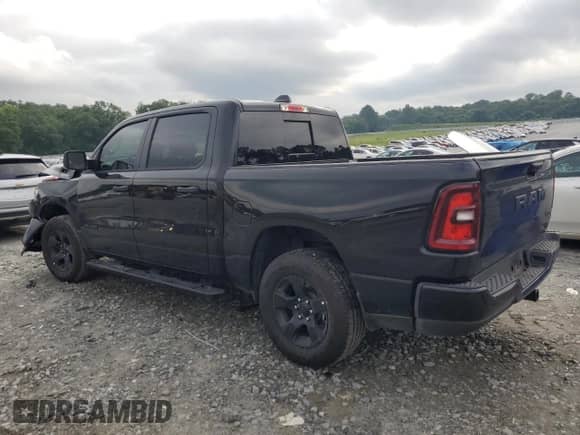 2025 Ram 1500 Tradesman with VIN 1C6RRFGG5SN592771, listed as a Copart auction lot 59027905 with 10,450 mi miles and Salvage title. Bid and sale history available at DreamBid. Image 2.